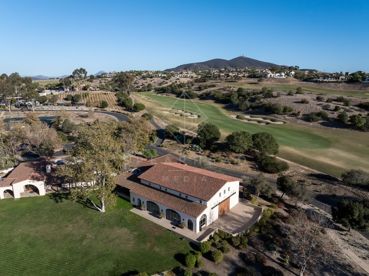 Aerial view of the country inland, homes and the buildings in Santaluz.