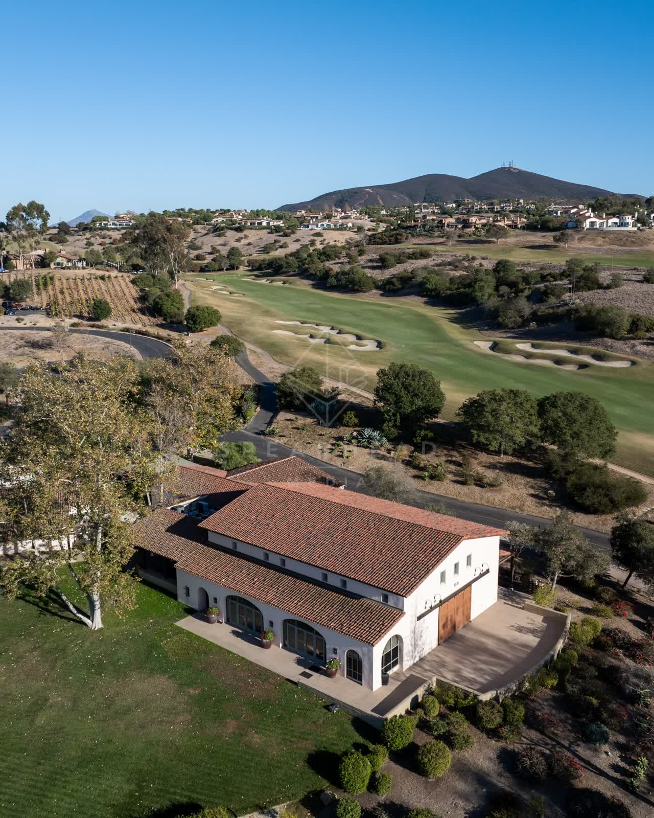 Aerial view of the country inland, homes and the buildings in Santaluz.