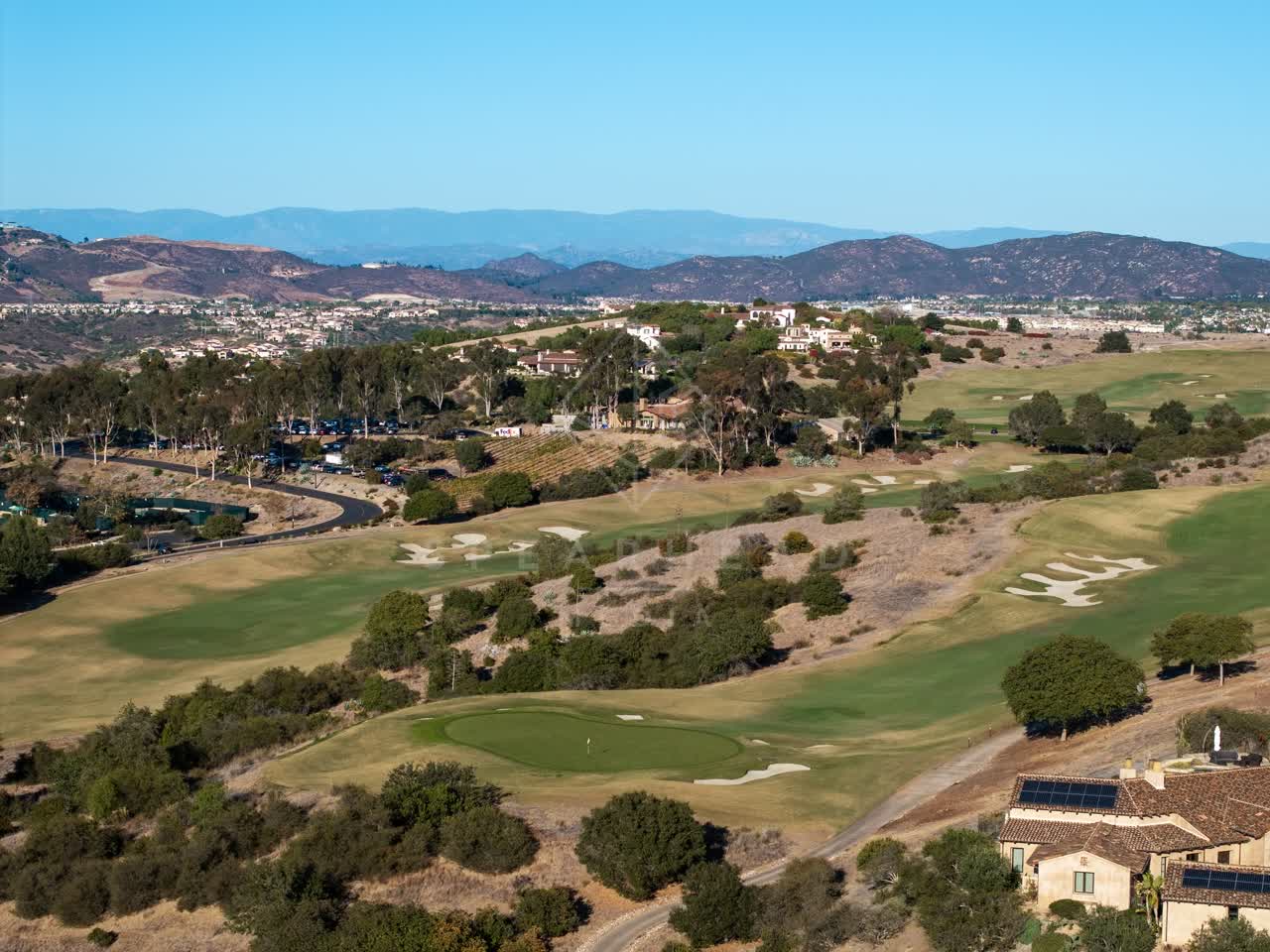 Aerial view of the country inland, homes and the buildings in Santaluz.