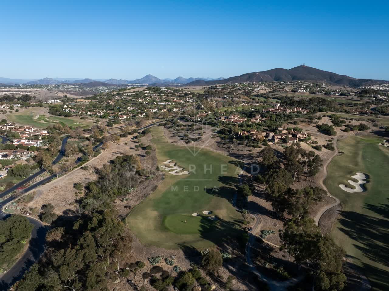 Aerial view of the country inland, homes and the buildings in Santaluz.