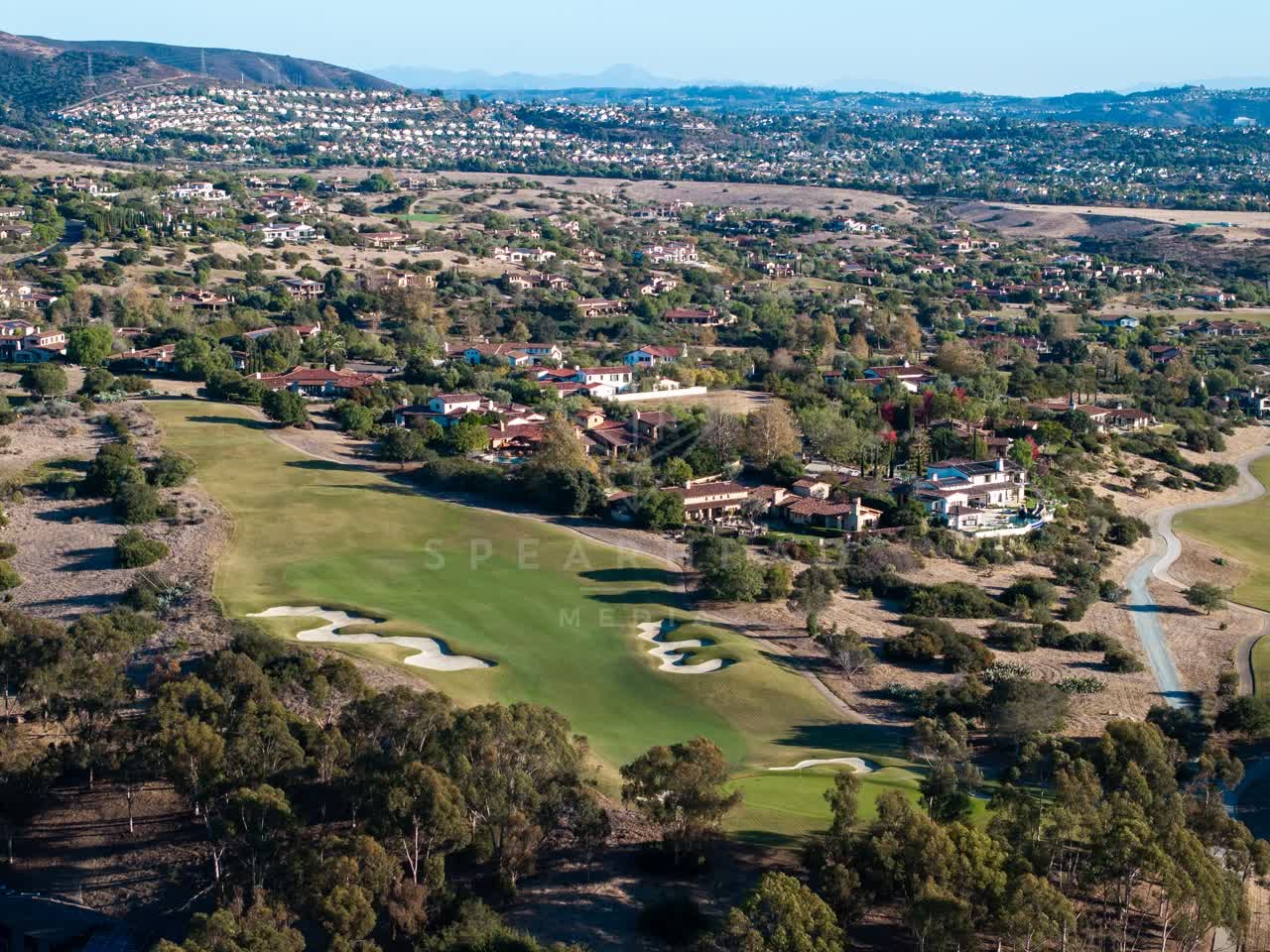 Aerial view of the country inland, homes and the buildings in Santaluz.
