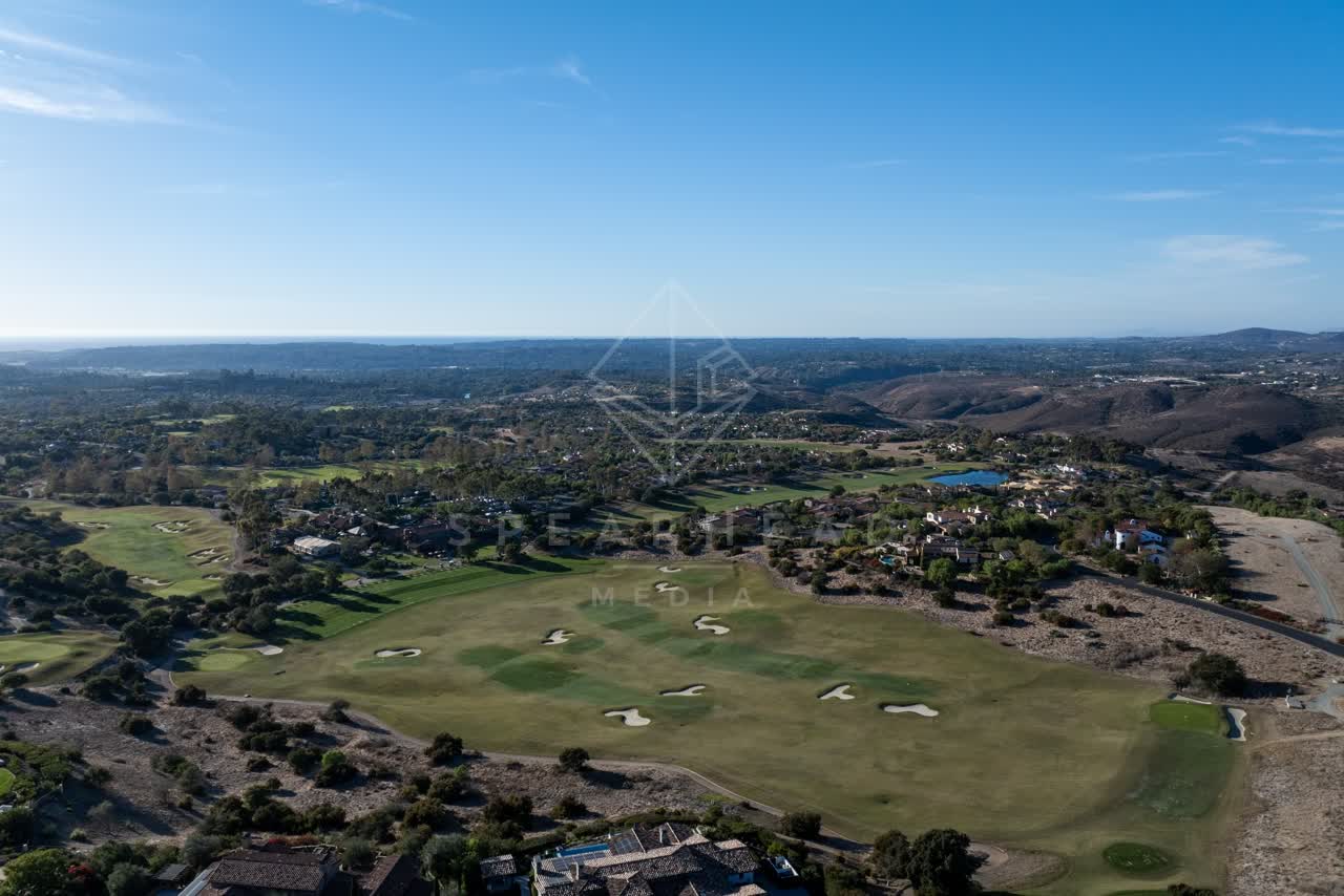 Aerial view of the country inland, homes and the buildings in Santaluz.