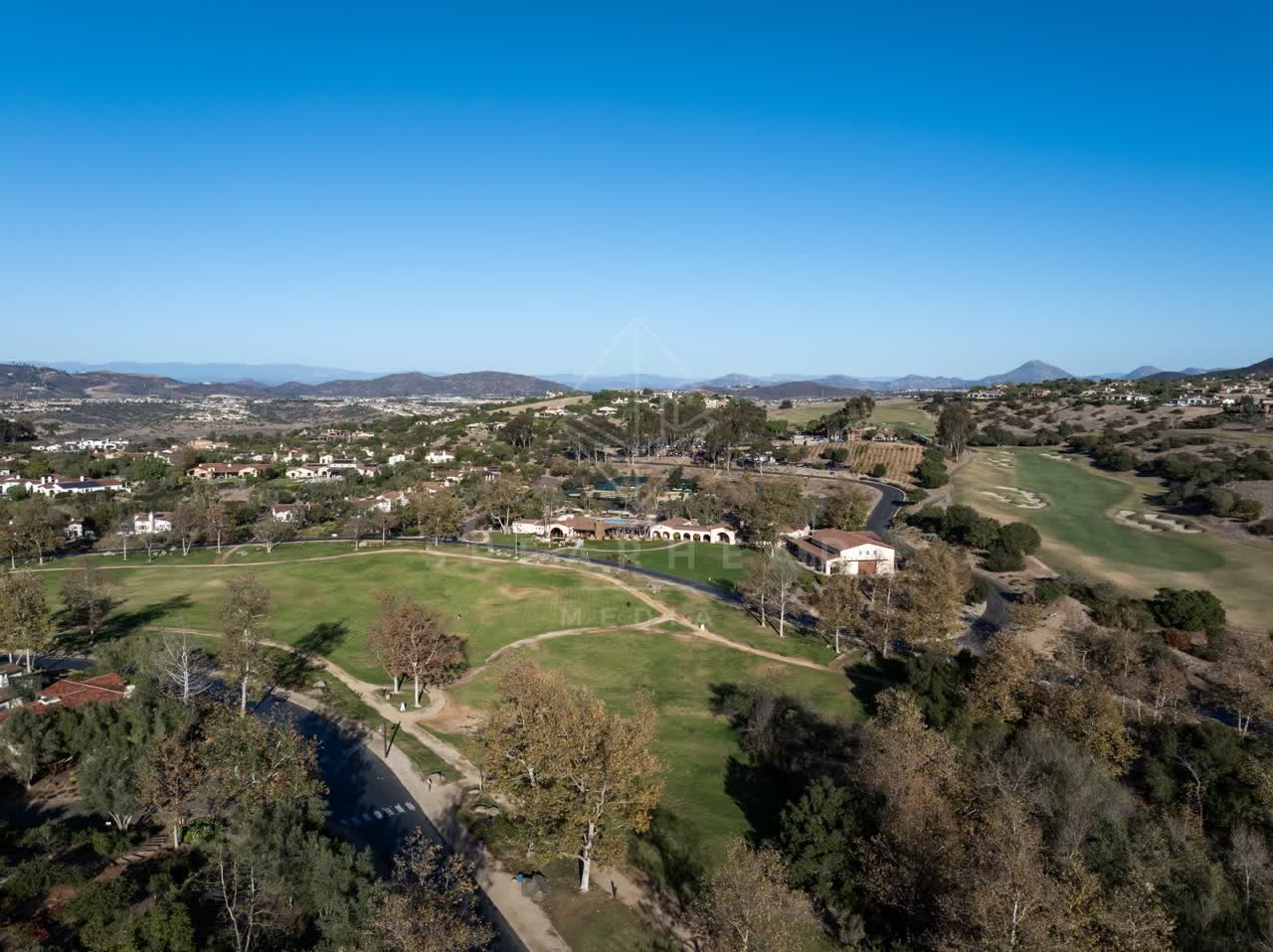 Aerial view of the country inland, homes and the buildings in Santaluz.