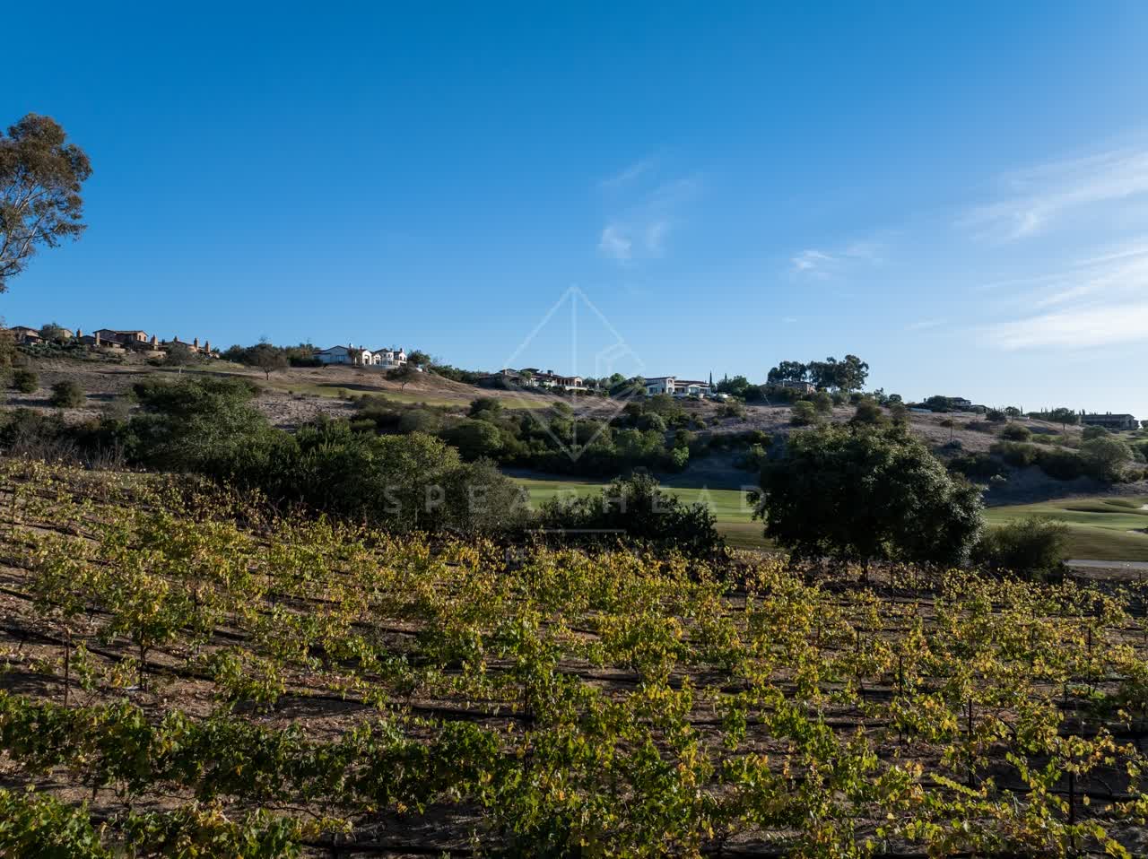 The country inland, homes and traffic in Santaluz.