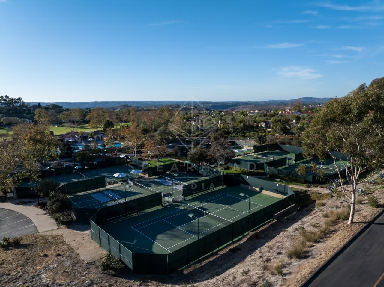 Aerial view of the country inland, homes and the buildings in Santaluz.