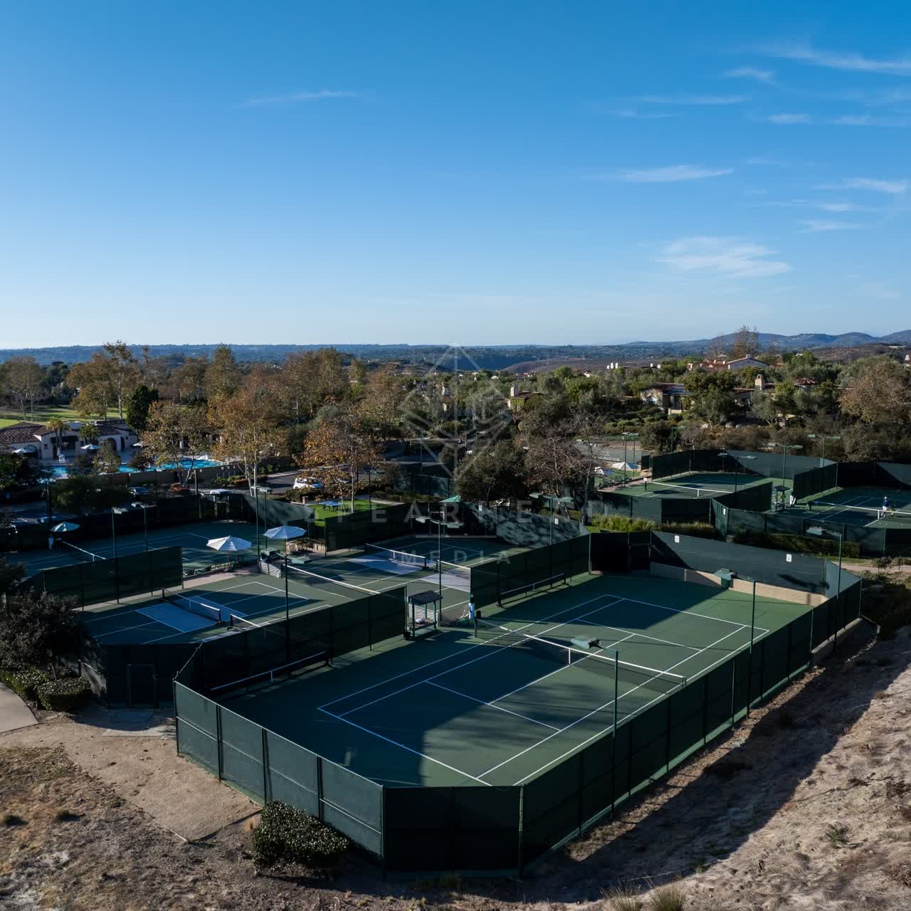 Aerial view of the country inland, homes and the buildings in Santaluz.