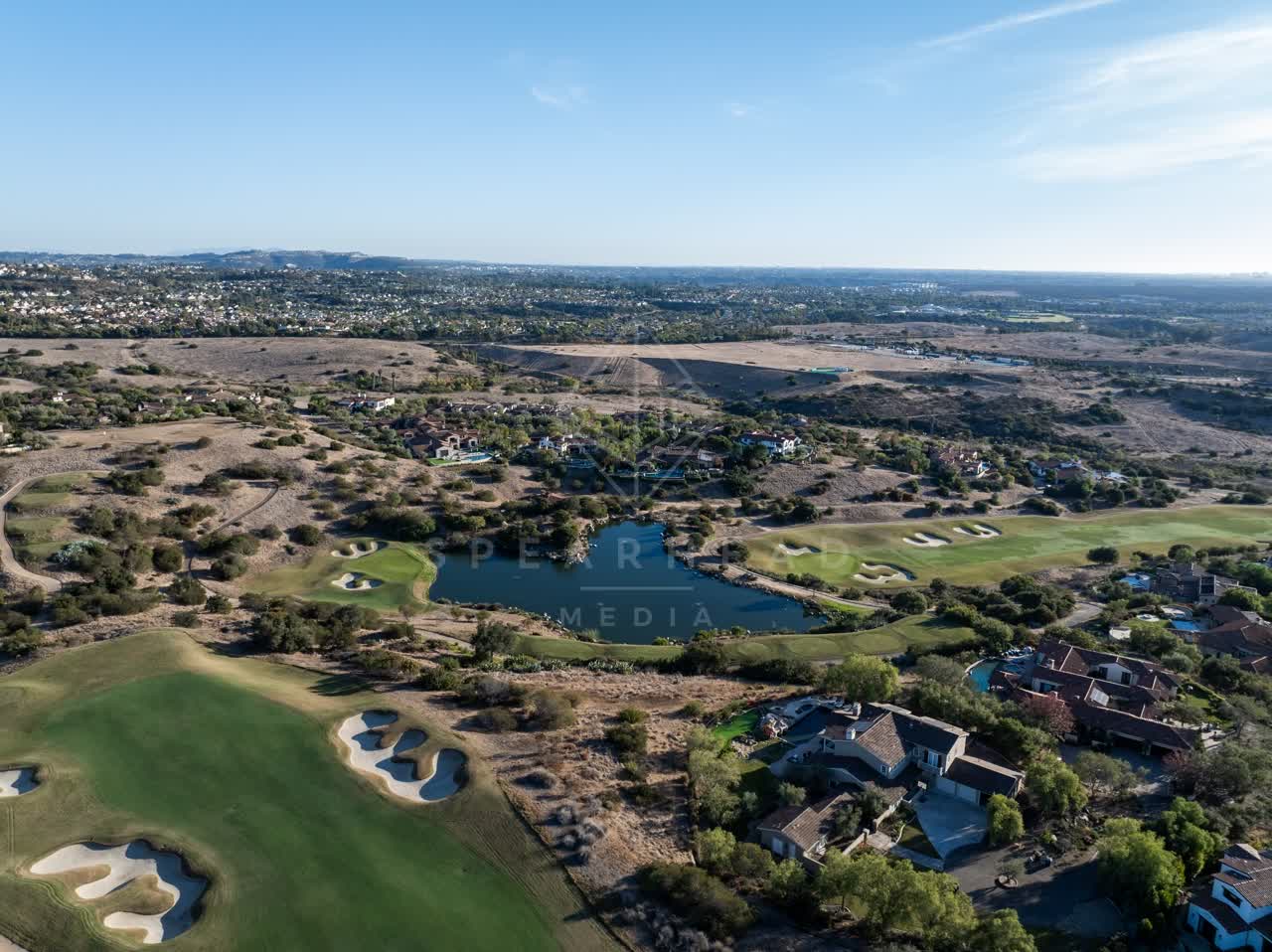 Aerial view of the country inland, homes and the buildings in Santaluz.