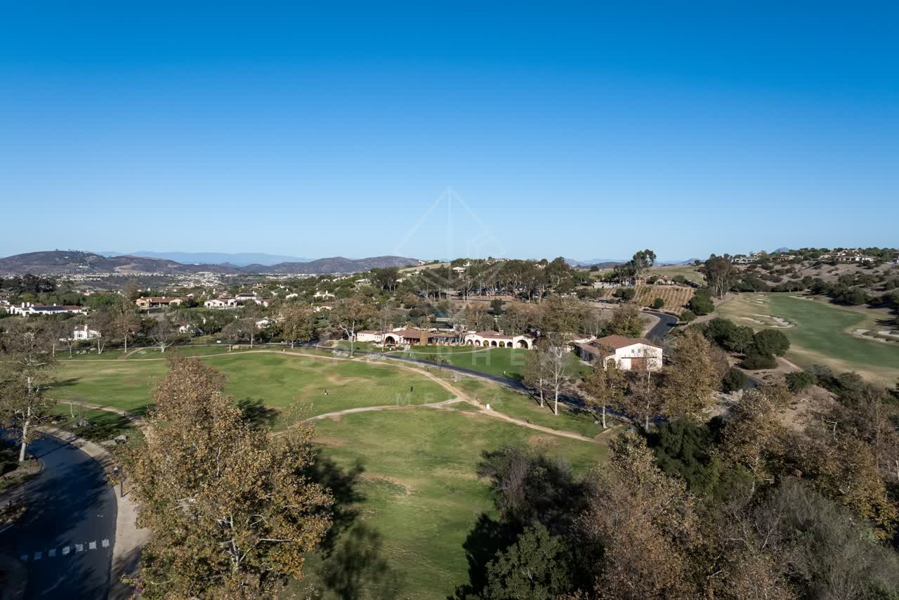 Aerial view of the country inland, homes and the buildings in Santaluz.