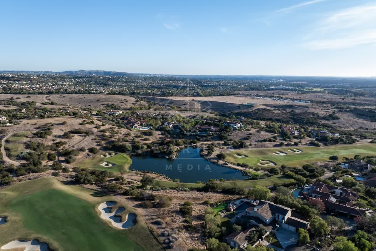 Aerial view of the country inland, homes and the buildings in Santaluz.