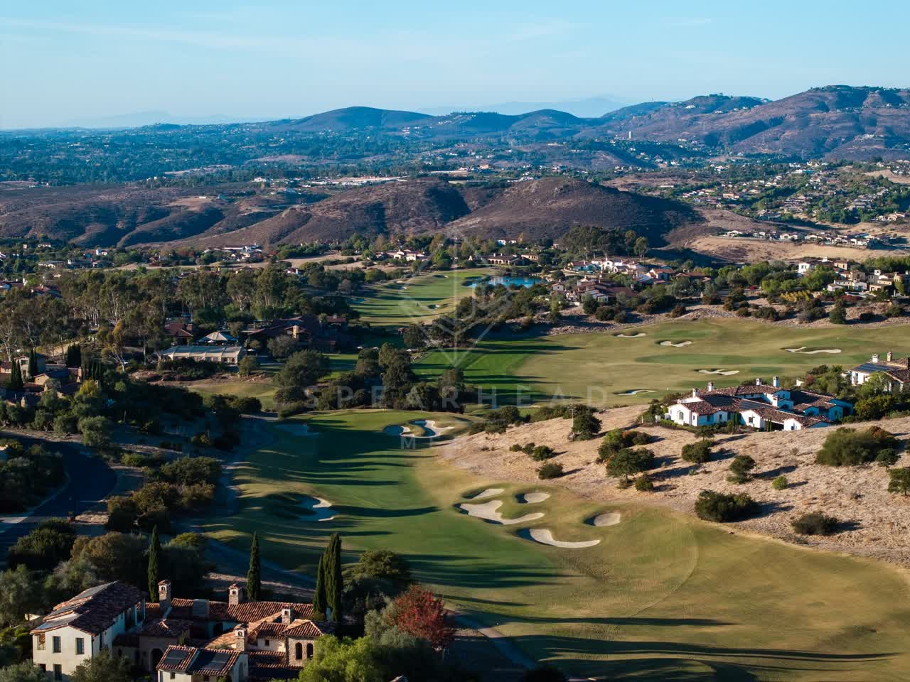 Aerial view of the country inland, homes and the buildings in Santaluz.