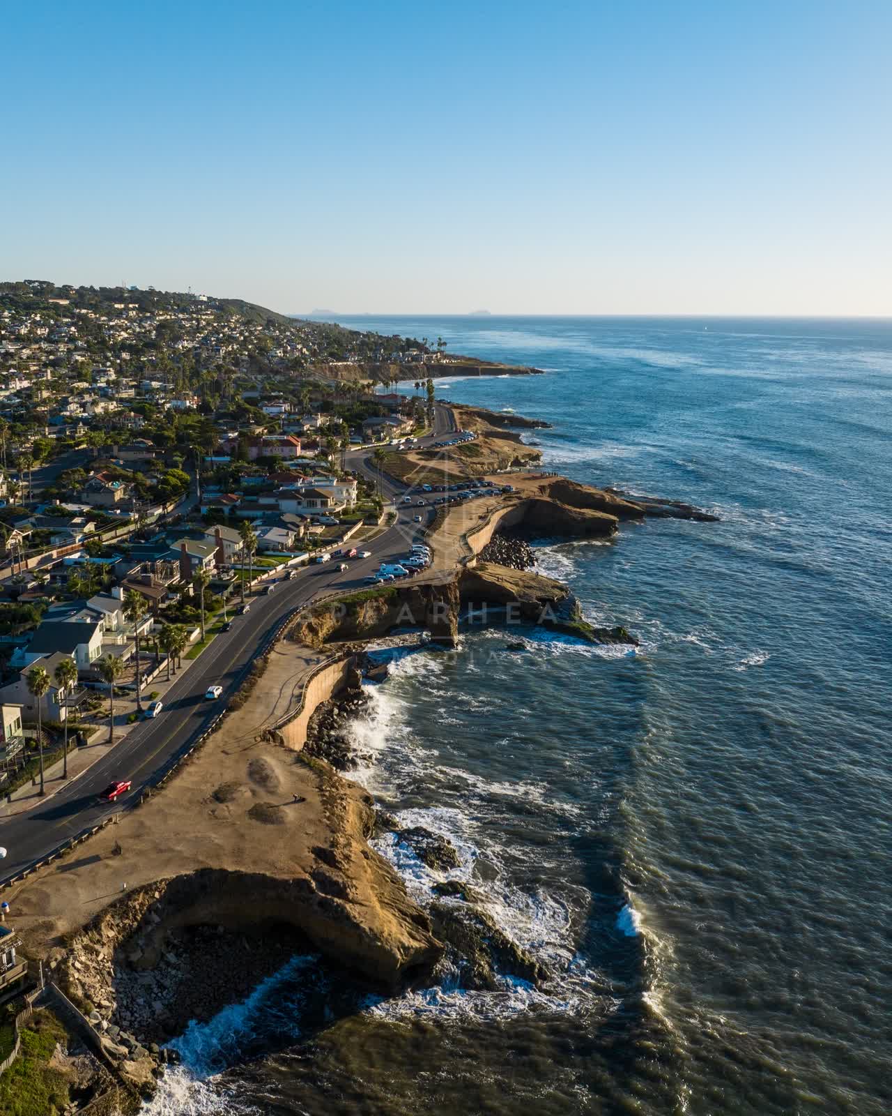 Aerial view of the cliffs, the ocean and homes at Sunset Cliffs.
