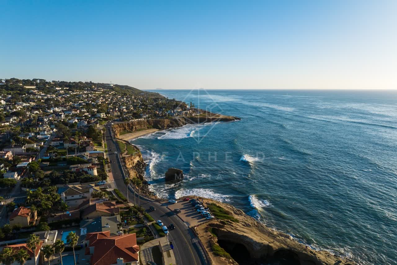 Aerial view of the cliffs, the ocean and homes at Sunset Cliffs.