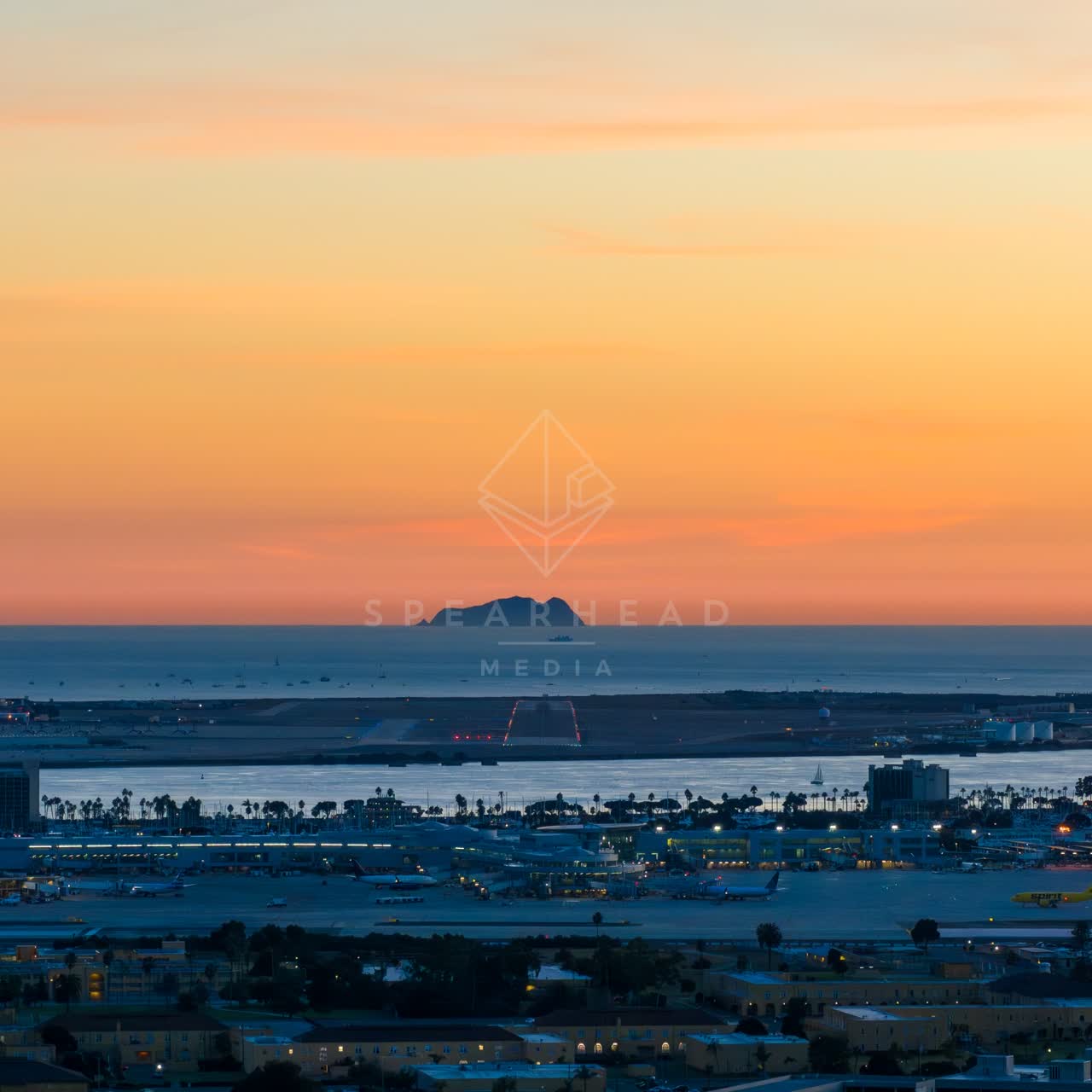 Aerial view of the harbor, boats and the ocean in San Diego Bay.