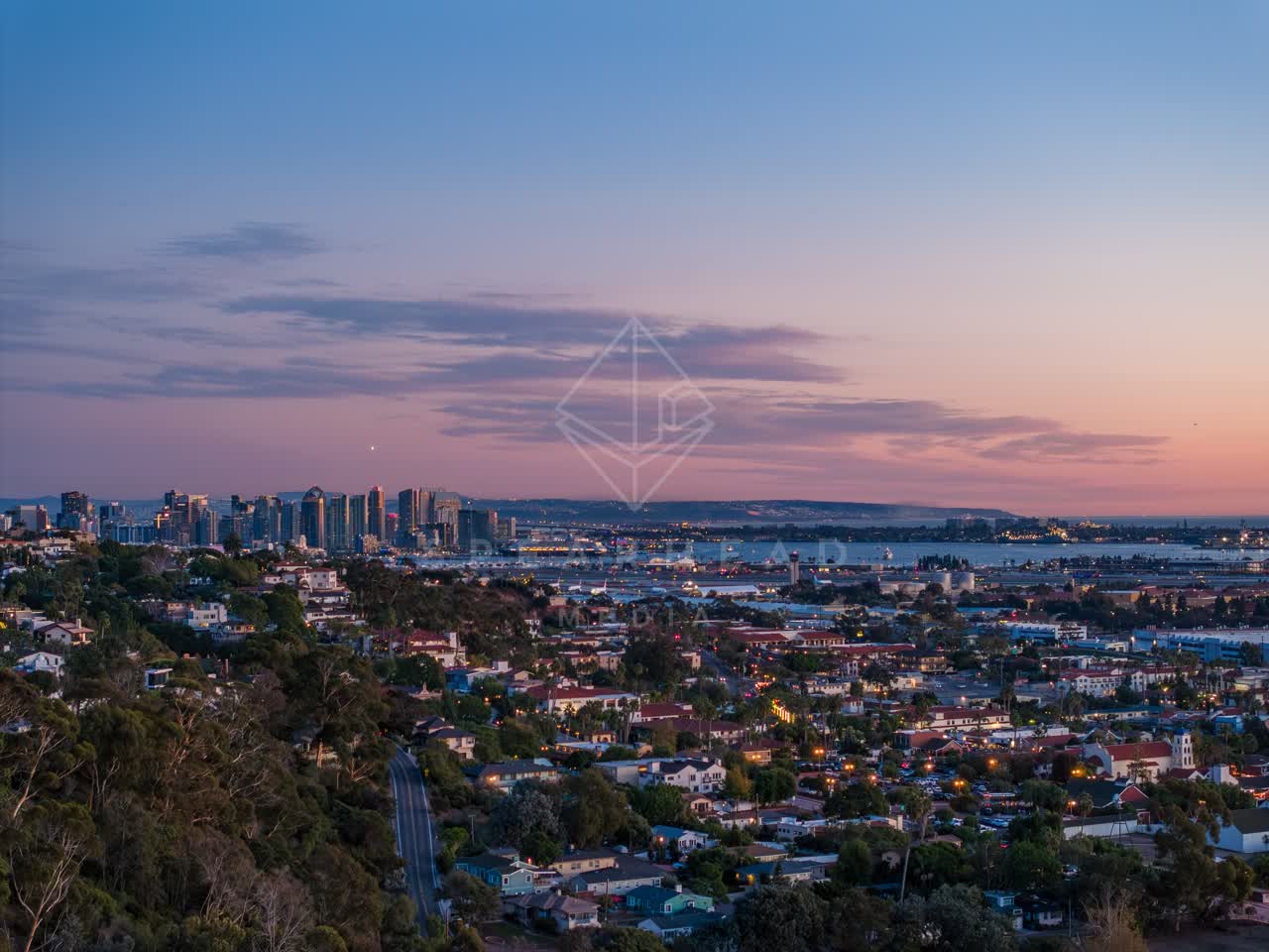 Aerial view of a residential street, the skyline and the bay in Downtown San Diego.