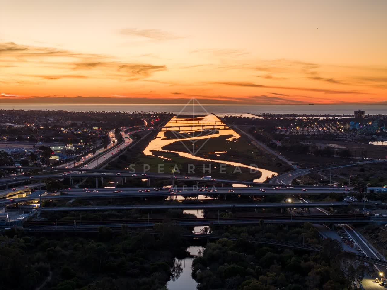 Aerial view of the country inland, the bridge and the ocean in Mission Bay.