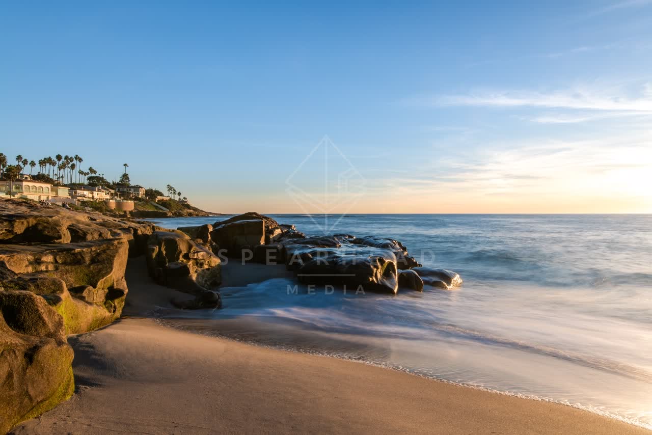 The beach, the surf and palm trees at Windansea.