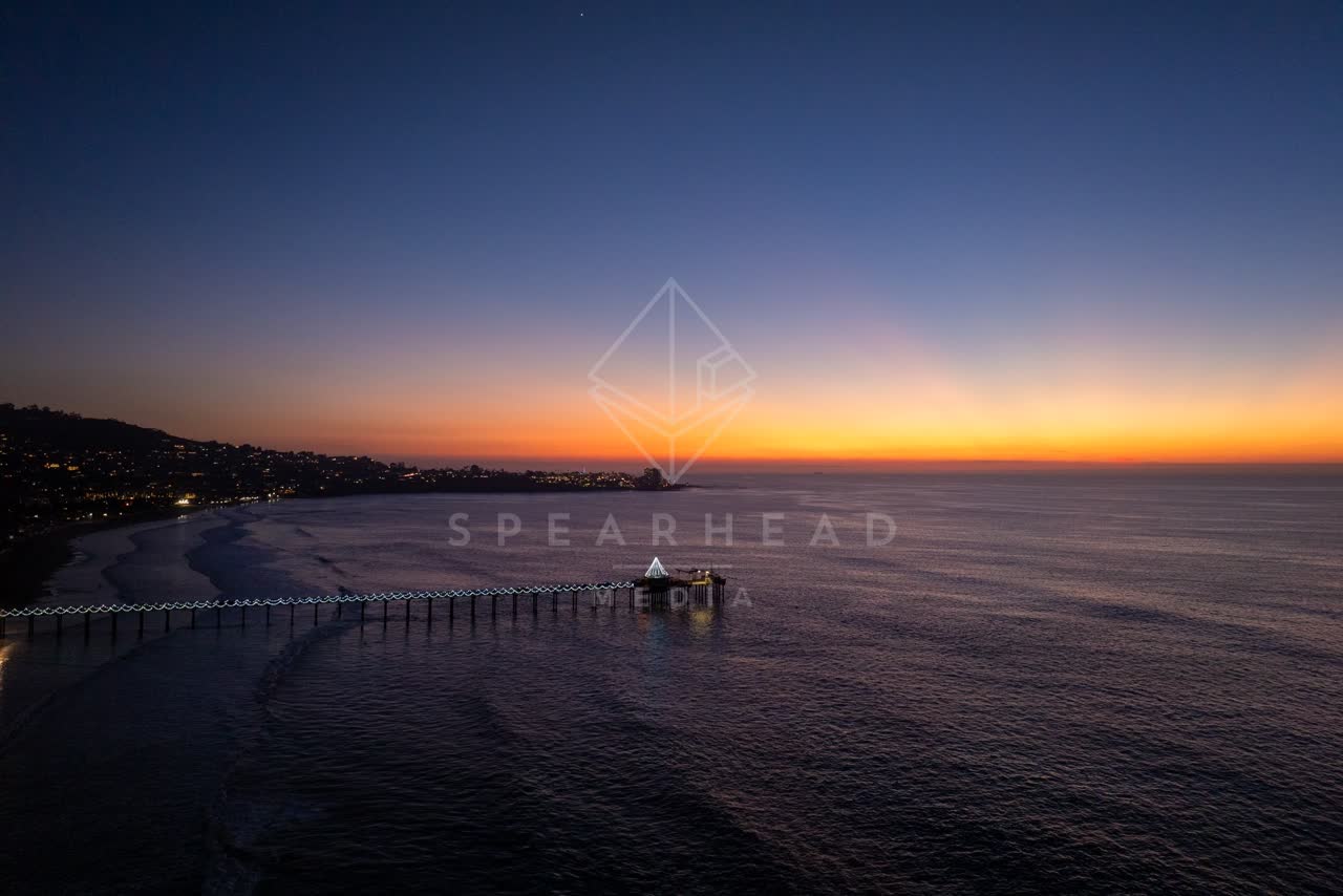Aerial view of the beach, the pier and the ocean at La Jolla Shores.