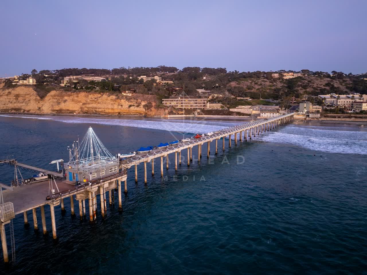 Aerial view of the beach, the pier and the ocean at La Jolla Shores.