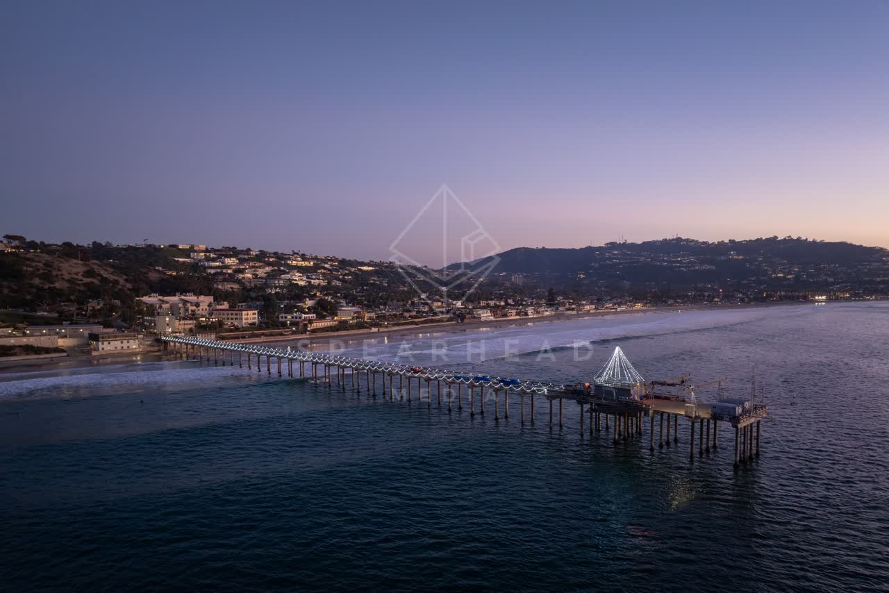 Aerial view of the beach, the pier and the ocean at La Jolla Shores.