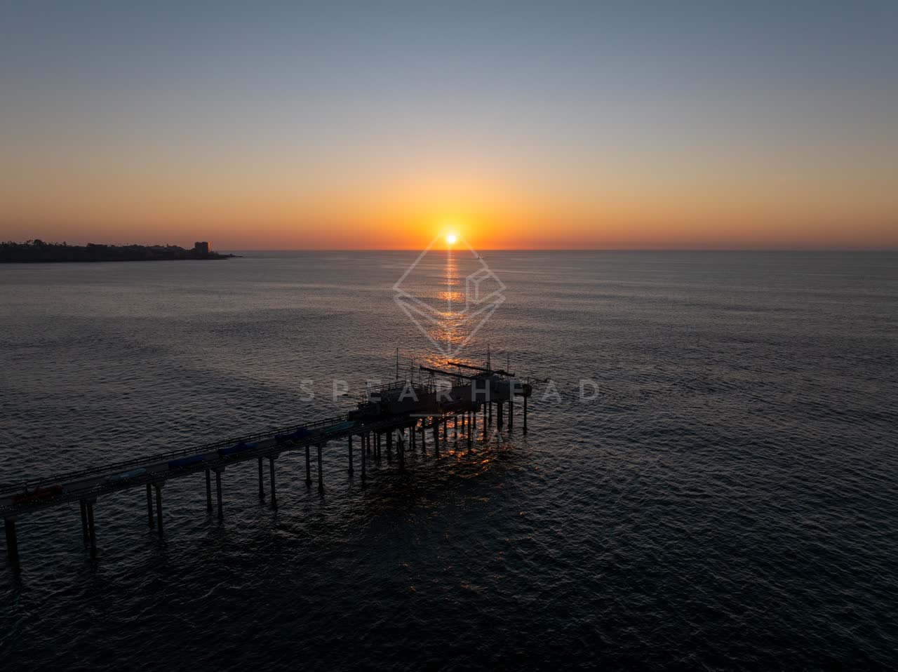 Aerial view of the beach, the pier and the ocean at La Jolla Shores.