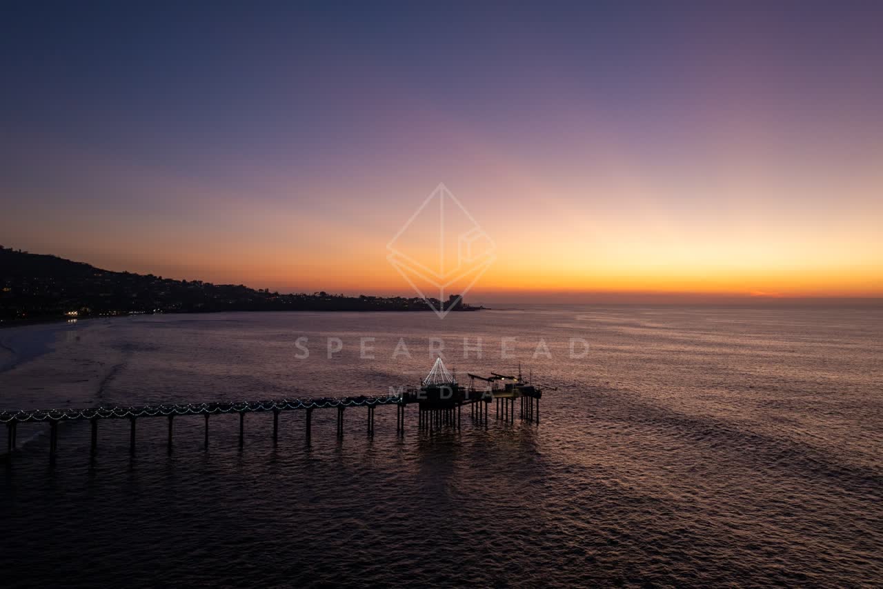 Aerial view of the beach, the pier and the ocean at La Jolla Shores.