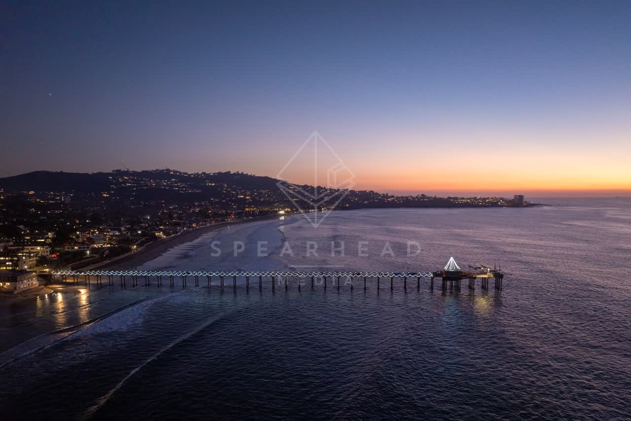 Aerial view of the beach, the pier and the ocean at La Jolla Shores.