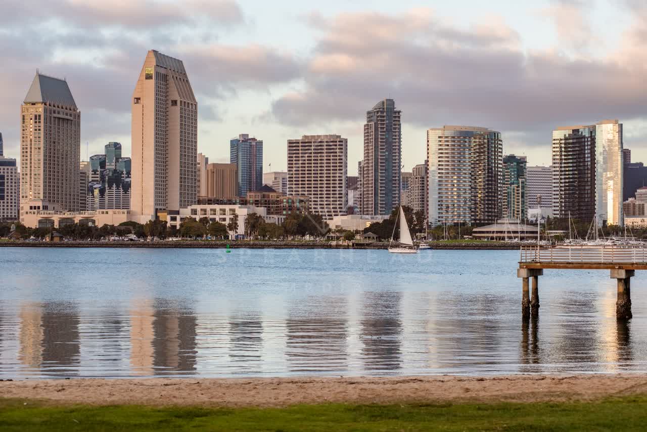 The downtown streets, the skyline and boats at Embarcadero, with boats out.