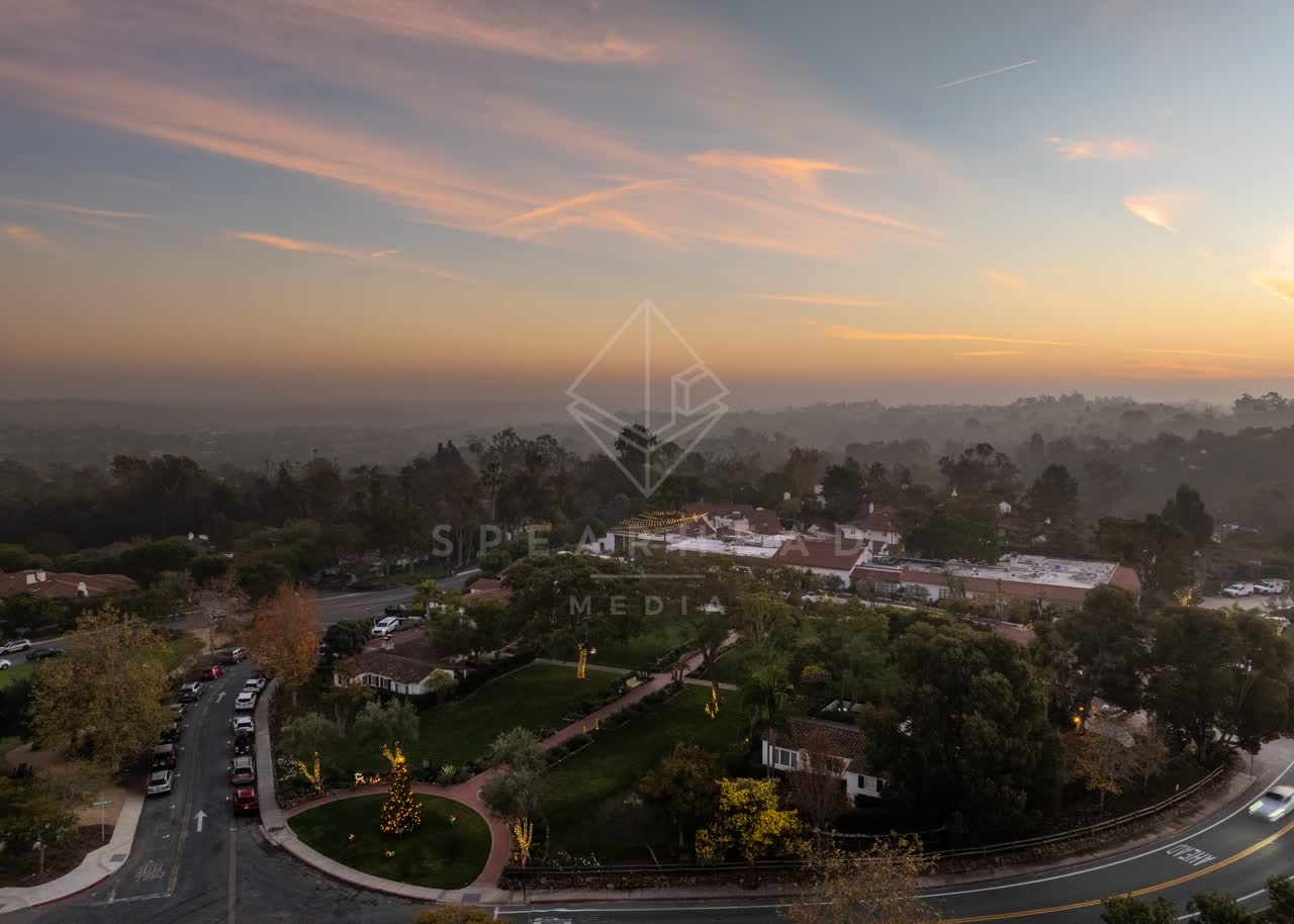 Aerial view of a residential street, homes and traffic at Covenant.