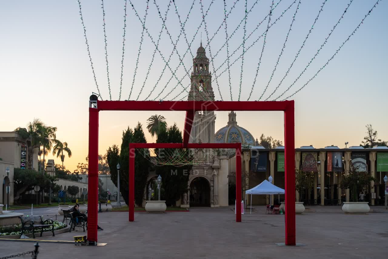 A park, palm trees and the buildings in Balboa Park.