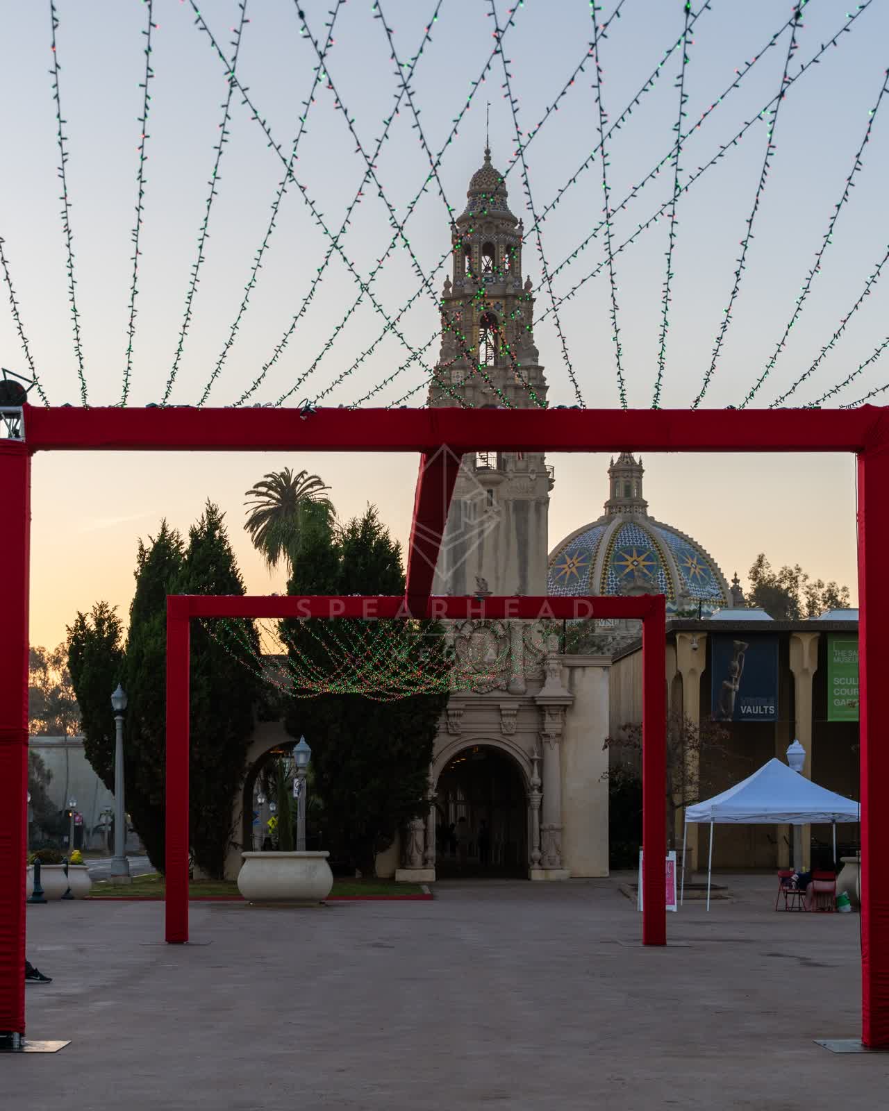 A park, palm trees and the buildings in Balboa Park.