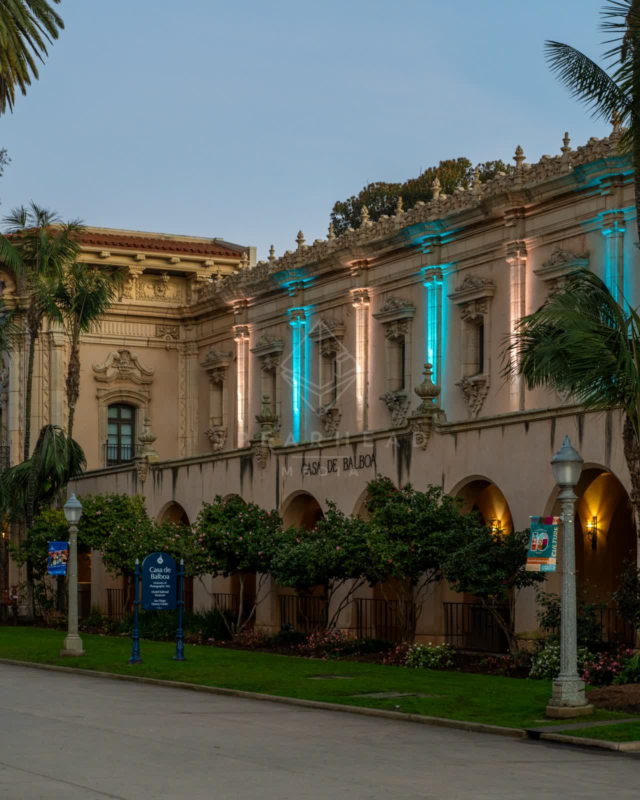 A park, palm trees and the buildings in Balboa Park.