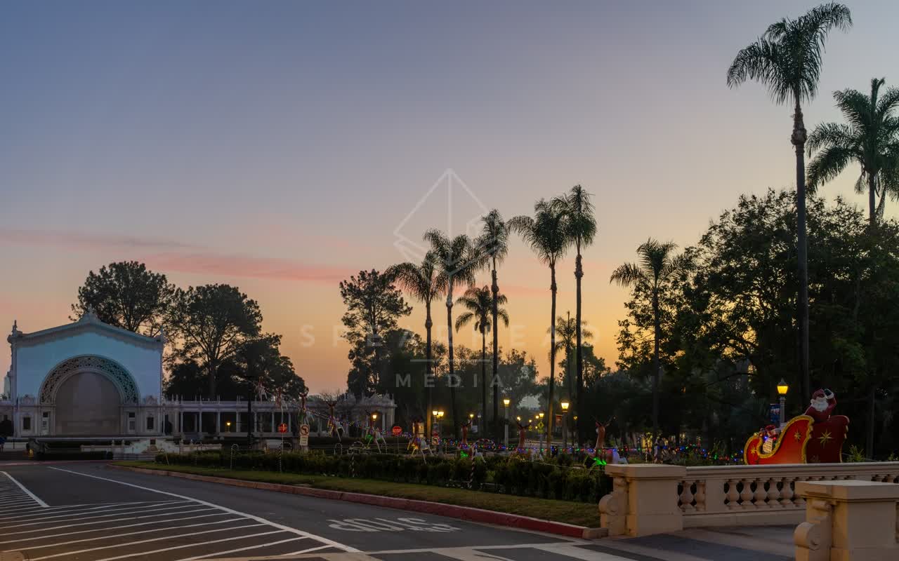 A park, palm trees and the buildings in Balboa Park.