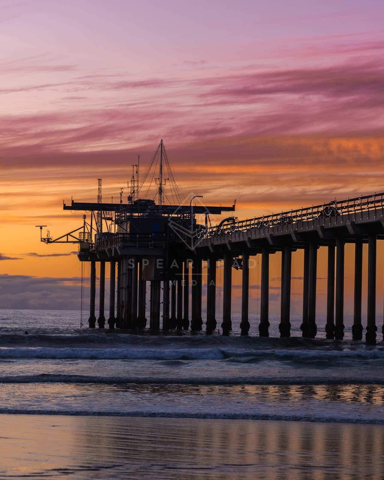 The beach, the surf and the pier at La Jolla Shores.
