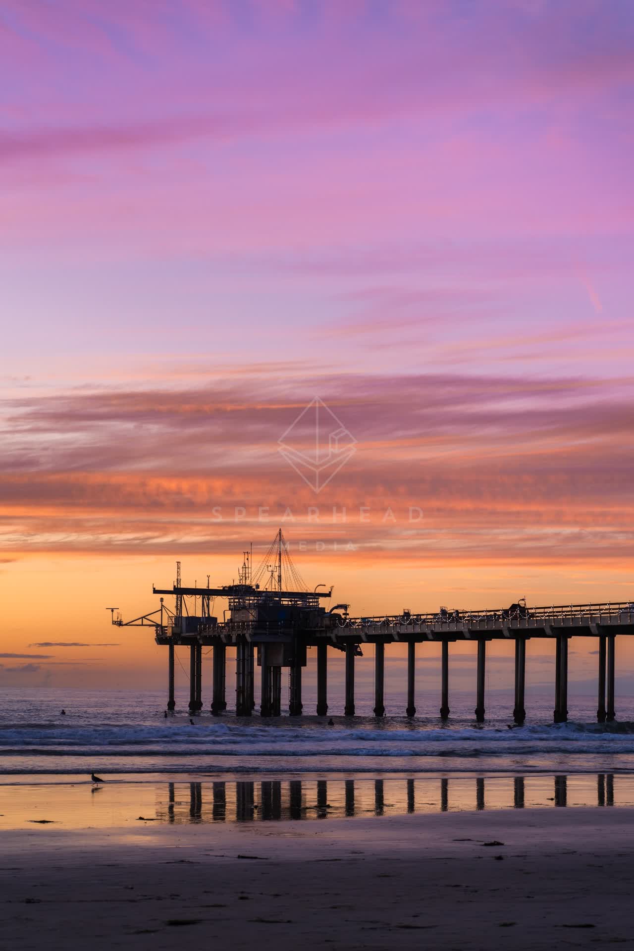 The beach, the surf and the pier at La Jolla Shores.