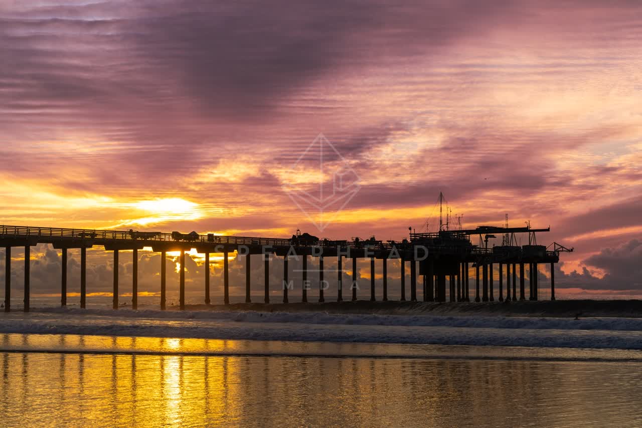 The beach, the surf and the pier at La Jolla Shores.