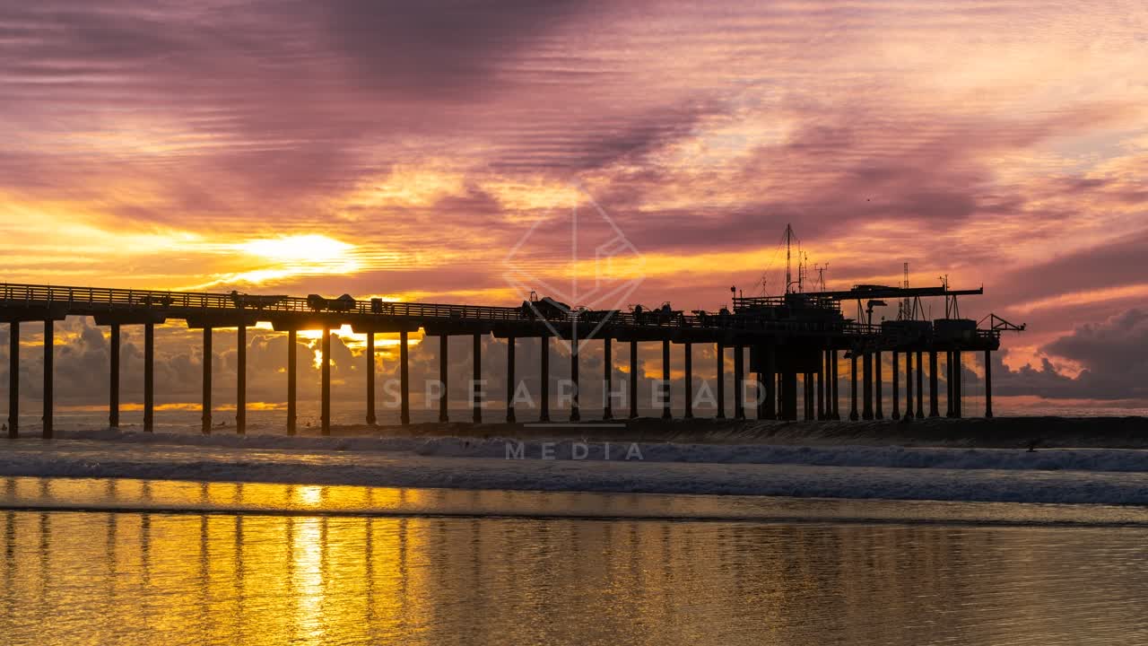 The beach, the surf and the pier at La Jolla Shores.