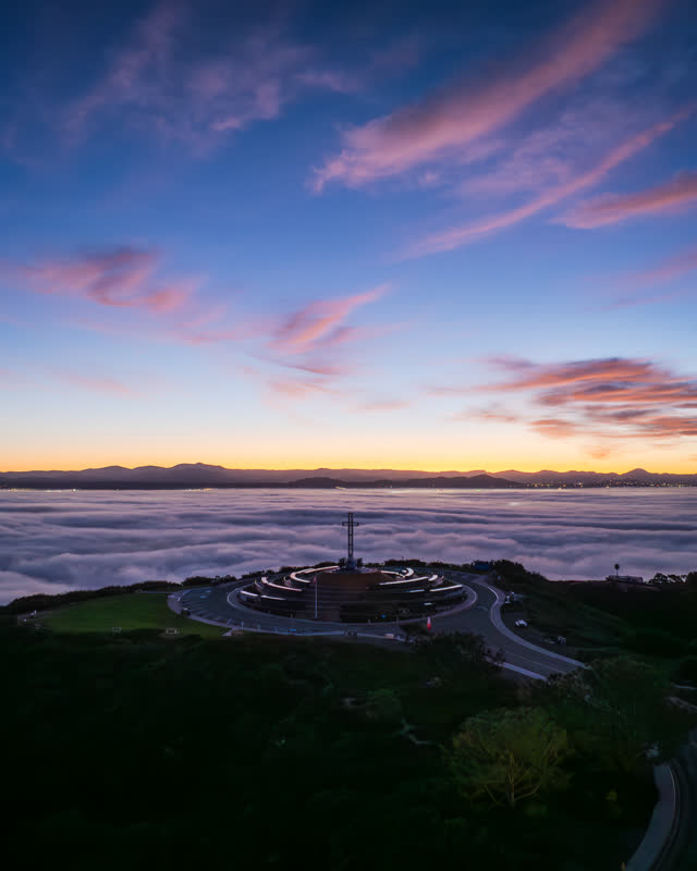 Aerial view of the cliffs, traffic and open country at Mount Soledad.