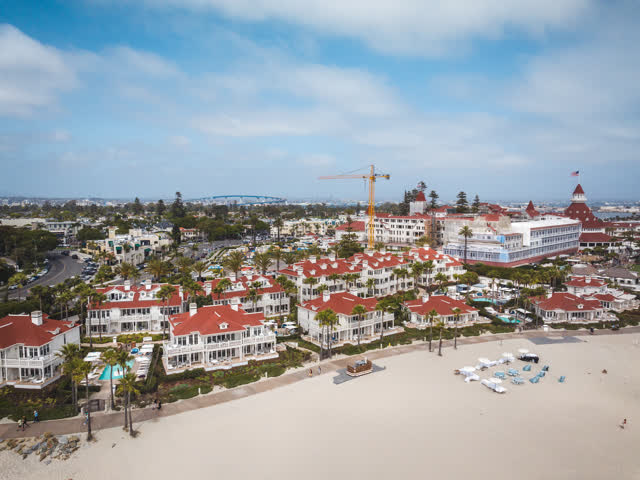 Aerial view of the beach, the pier and the bridge at Coronado Beach.
