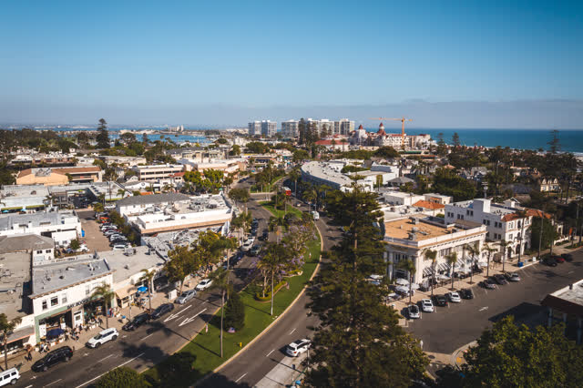 Aerial view of the downtown streets, palm trees and the ocean in Coronado.