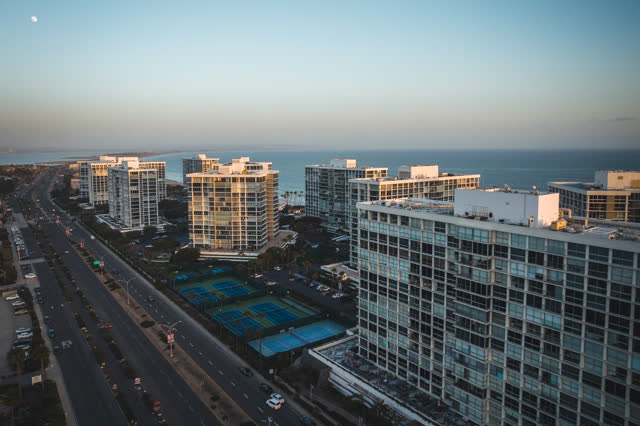 Aerial view of a residential street, the ocean and homes at Coronado Beach.