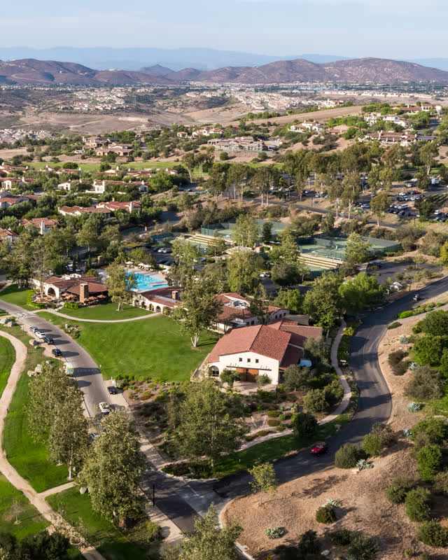 Aerial view of the country inland, homes and the buildings in Santaluz.