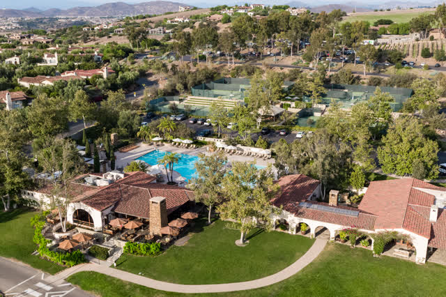 Aerial view of the country inland, palm trees and the buildings in Santaluz.