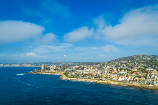 Aerial view of the cliffs, the ocean and homes at La Jolla Cove.