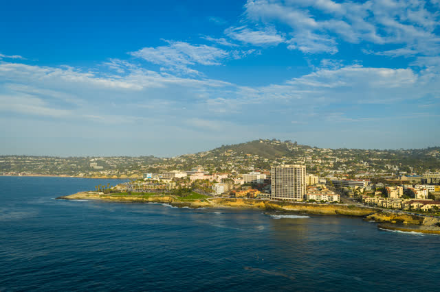 Aerial view of the cliffs, the ocean and homes at La Jolla Cove.