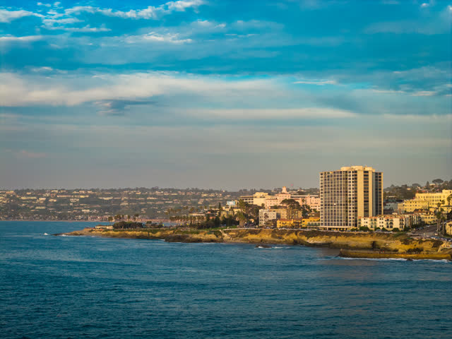 Aerial view of the cliffs, the ocean and homes at La Jolla Cove.