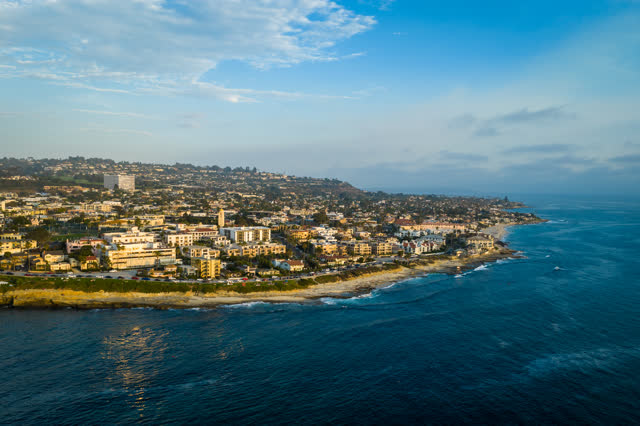 Aerial view of the cliffs, the ocean and homes at La Jolla Cove.