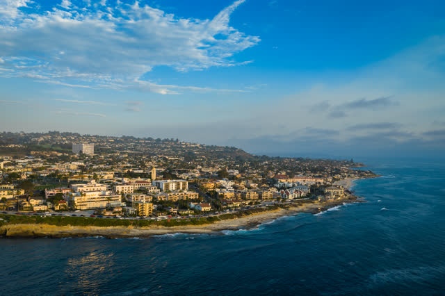 Aerial view of the cliffs, the ocean and homes at La Jolla Cove.