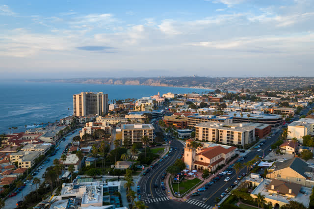 Aerial view of the downtown streets, palm trees and the ocean at La Jolla Cove.