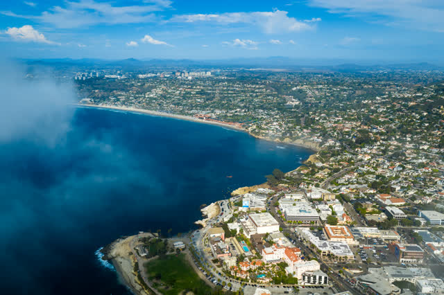 Aerial view of the cliffs, the ocean and the bay at La Jolla Cove.
