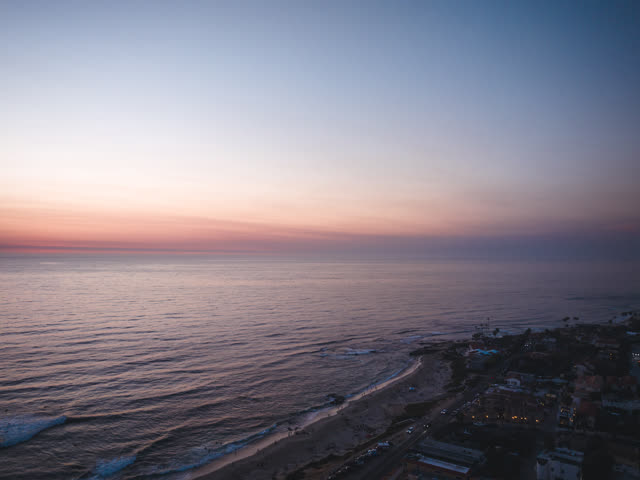 Aerial view of the beach, the ocean and homes at Windansea.